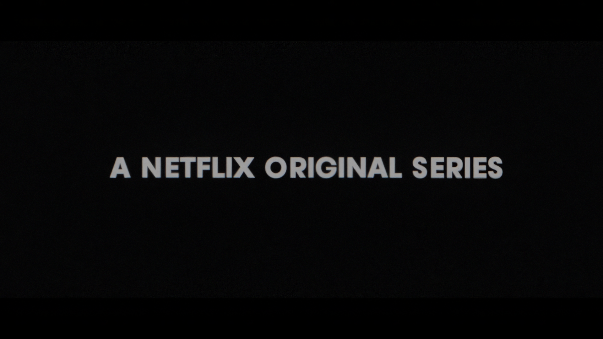 Title card: A Netflix Original Series on film grain
